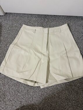 ASTR the Label Cream Faux Leather Pleated High Waist Shorts